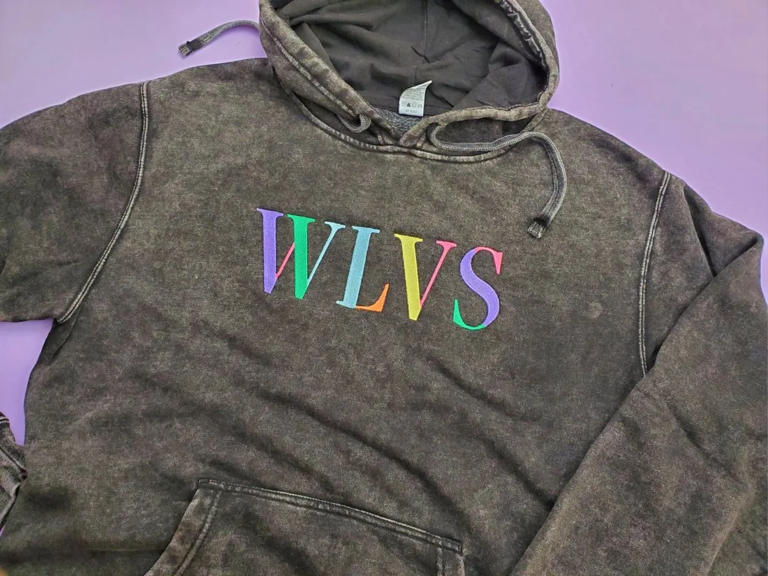 Black acid-wash WLVS rainbow hoodie